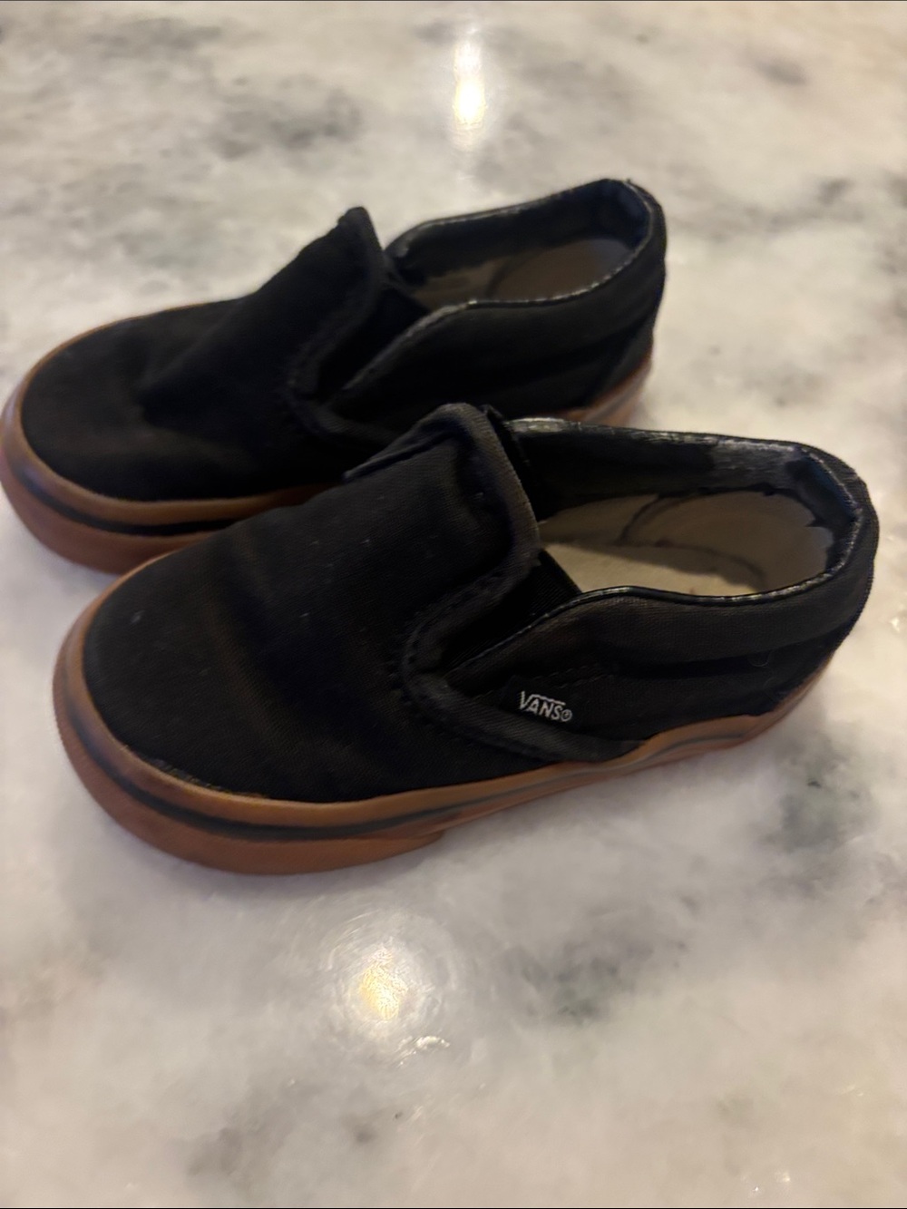 Vans Kids Black Slip-On Sneakers with Gum Sole
